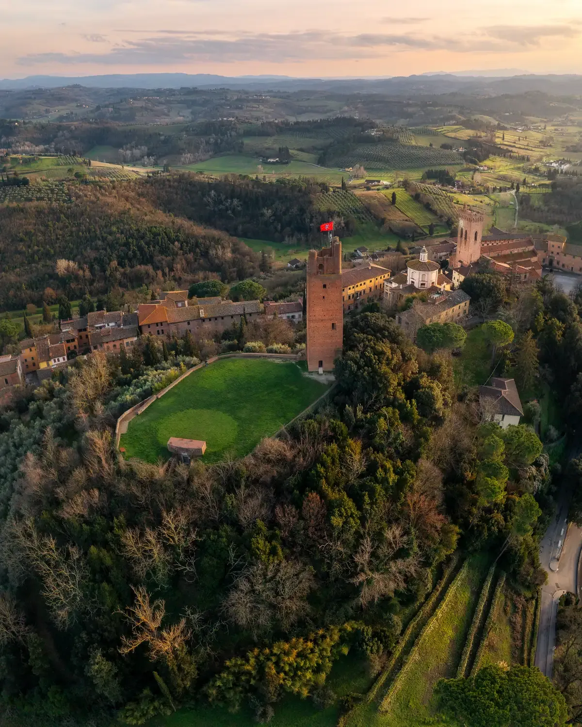 Aerial view of San Miniato at sunset, the hill town at the centre of truffle hunting in Tuscany